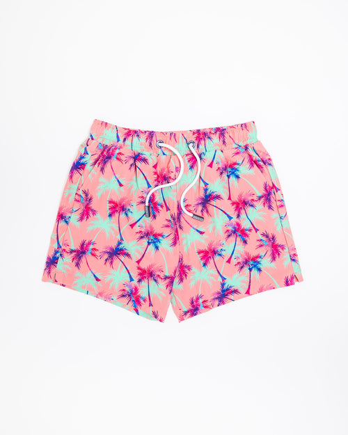 Sharkies Swimwear Falling Palms Positano Swim Shorts featuring a tropical palm print design with vibrant colors. Perfect for beach and poolside wear.