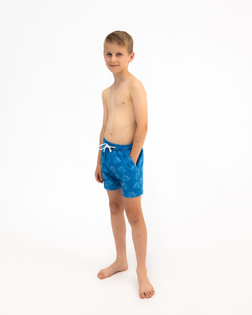 Sharkies Swimwear Boys Swim Shorts featuring a vibrant lion fish print. Colorful and fun design, ideal for active boys at the pool or beach.