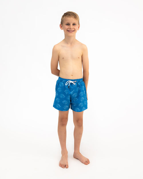 Sharkies Swimwear Boys Swim Shorts featuring a vibrant lion fish print. Colorful and fun design, ideal for active boys at the pool or beach.