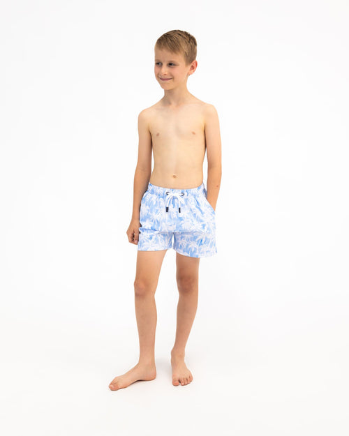 Sharkies Swimwear Maui Palm Swim Shorts featuring a tropical palm leaf pattern in vibrant colors. Stylish and comfortable swimwear perfect for beach and pool activities.