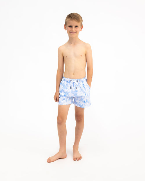 Sharkies Swimwear Maui Palm Swim Shorts featuring a tropical palm leaf pattern in vibrant colors. Stylish and comfortable swimwear perfect for beach and pool activities.