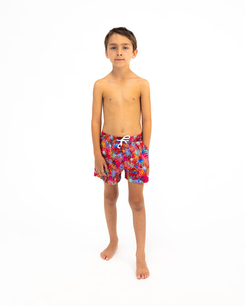 Sharkies Swimwear Tropicana Swim Shorts featuring a vibrant tropical plant pattern with bold colors. Perfect for adding a splash of fun and style to beach and pool outings.