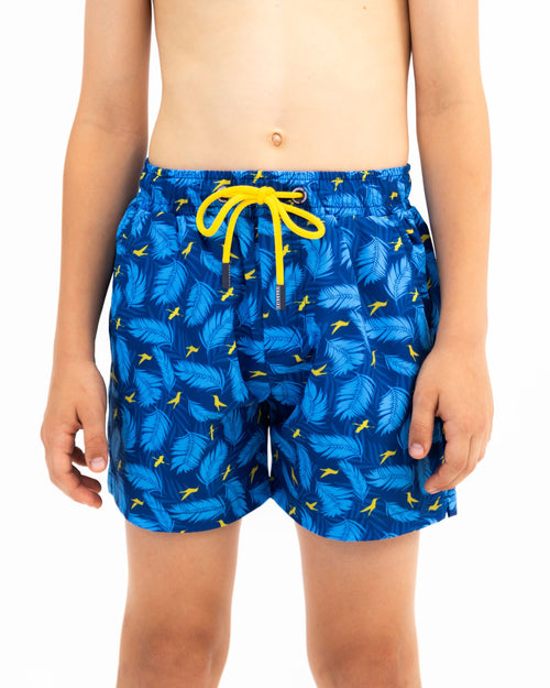 Sharkies Swimwear Boys Swim Shorts featuring a playful feather and stork print. Bright and colorful design ideal for young boys, perfect for swimming and beach outings