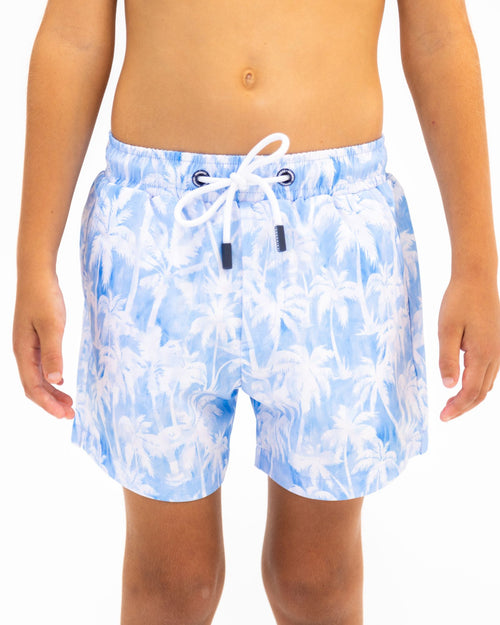 Sharkies Swimwear Maui Palm Swim Shorts featuring a tropical palm leaf pattern in vibrant colors. Stylish and comfortable swimwear perfect for beach and pool activities.