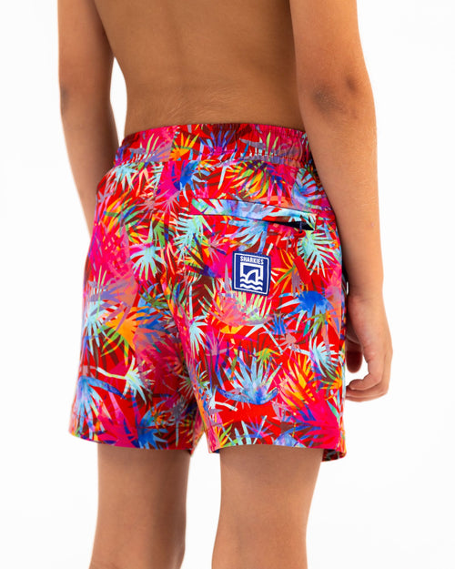 Sharkies Swimwear Tropicana Swim Shorts featuring a vibrant tropical plant pattern with bold colors. Perfect for adding a splash of fun and style to beach and pool outings.