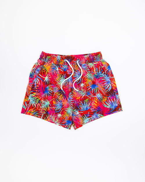 Sharkies Swimwear Tropicana Swim Shorts featuring a vibrant tropical plant pattern with bold colors. Perfect for adding a splash of fun and style to beach and pool outings.