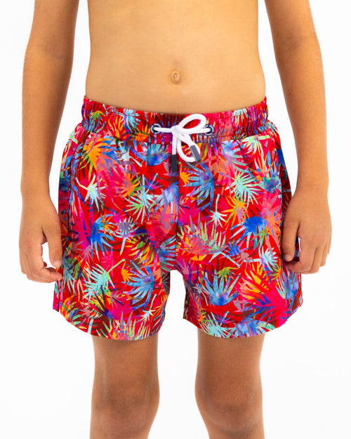 Sharkies Swimwear Tropicana Swim Shorts featuring a vibrant tropical plant pattern with bold colors. Perfect for adding a splash of fun and style to beach and pool outings.